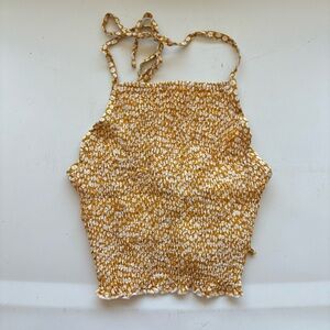 Yellow and white smocked floral halter top